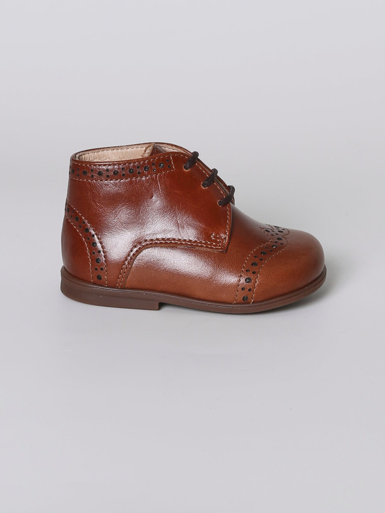 Bottines bout fleuri en cuir bébé