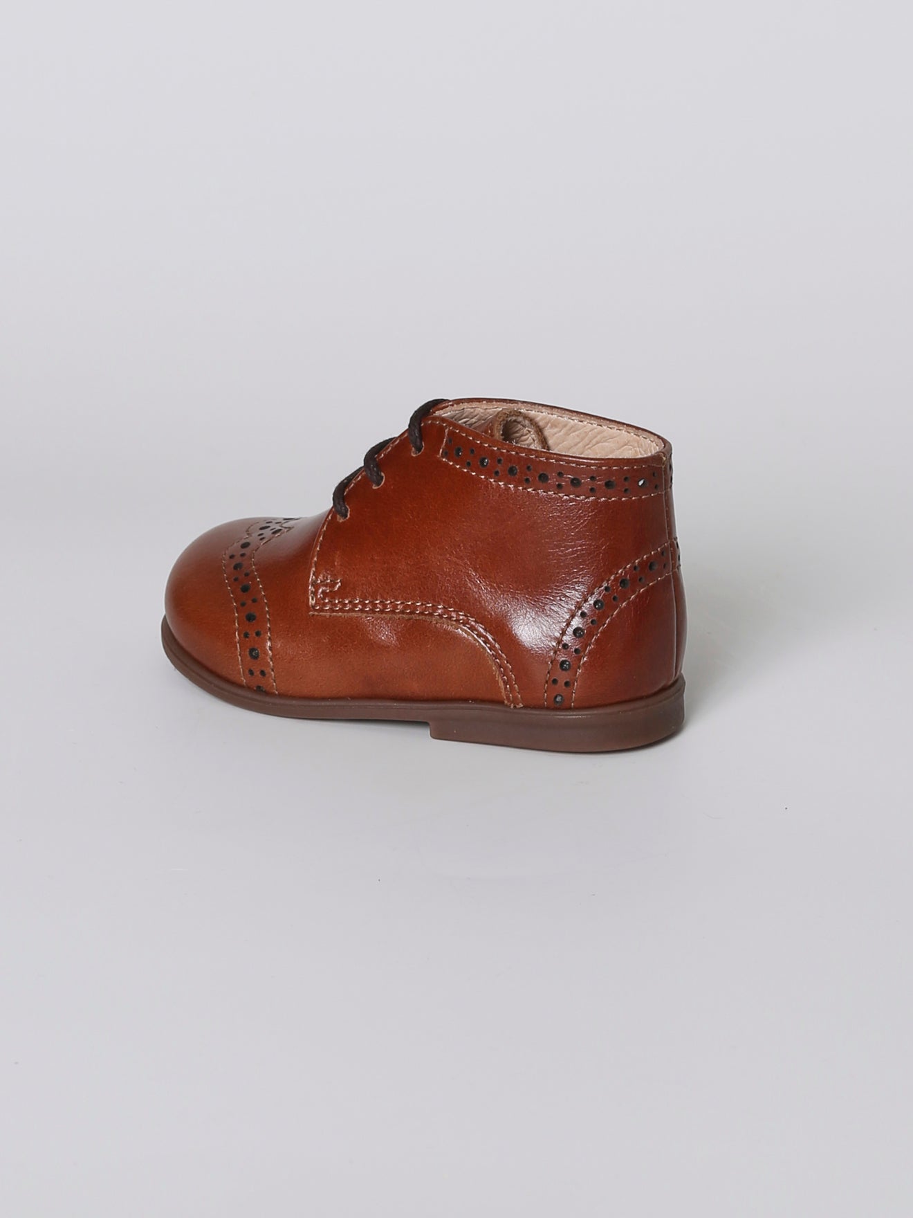 Bottines bout fleuri en cuir bébé